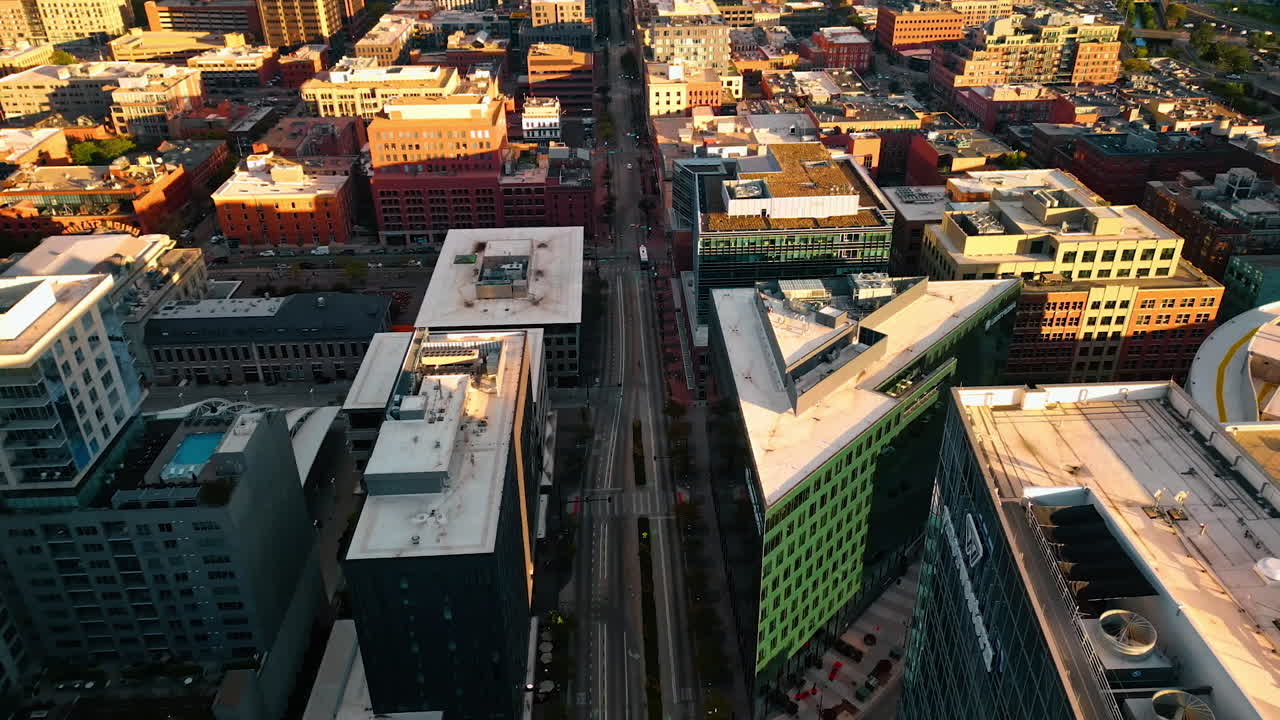 Denver, USA, 24 August 2025: City scenery in the light of setting sun. Drone footage over the cityscape of Denver, Colorado, USA