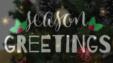 Animation-of-christmas-greetings-text-over-christmas-tree-with-decorations