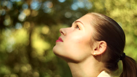 woman in profile view outdoors
