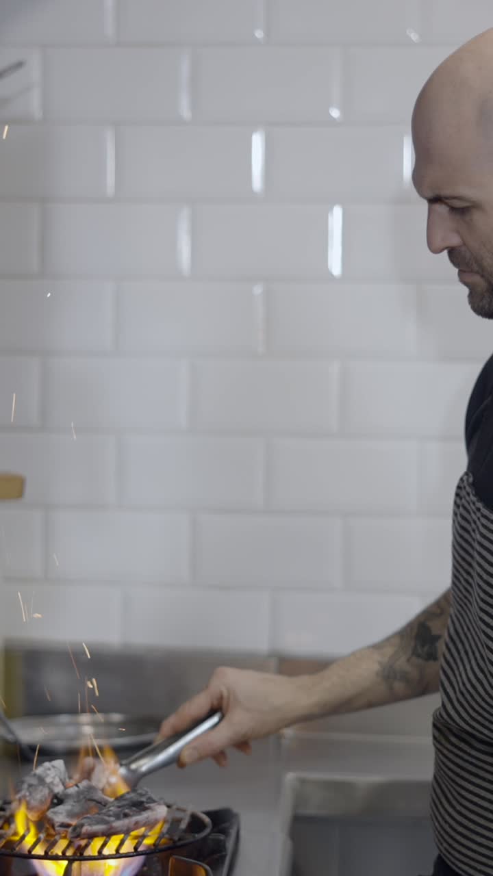 Chef Grilling Food with Open Flame and Sparks in a Kitchen