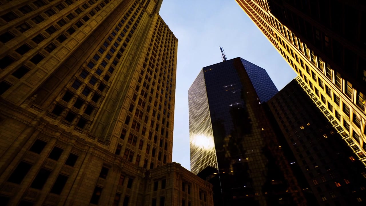 Torres escuras projetam silhuetas de estruturas urbanas contra o pano de fundo de um céu crepuscular.