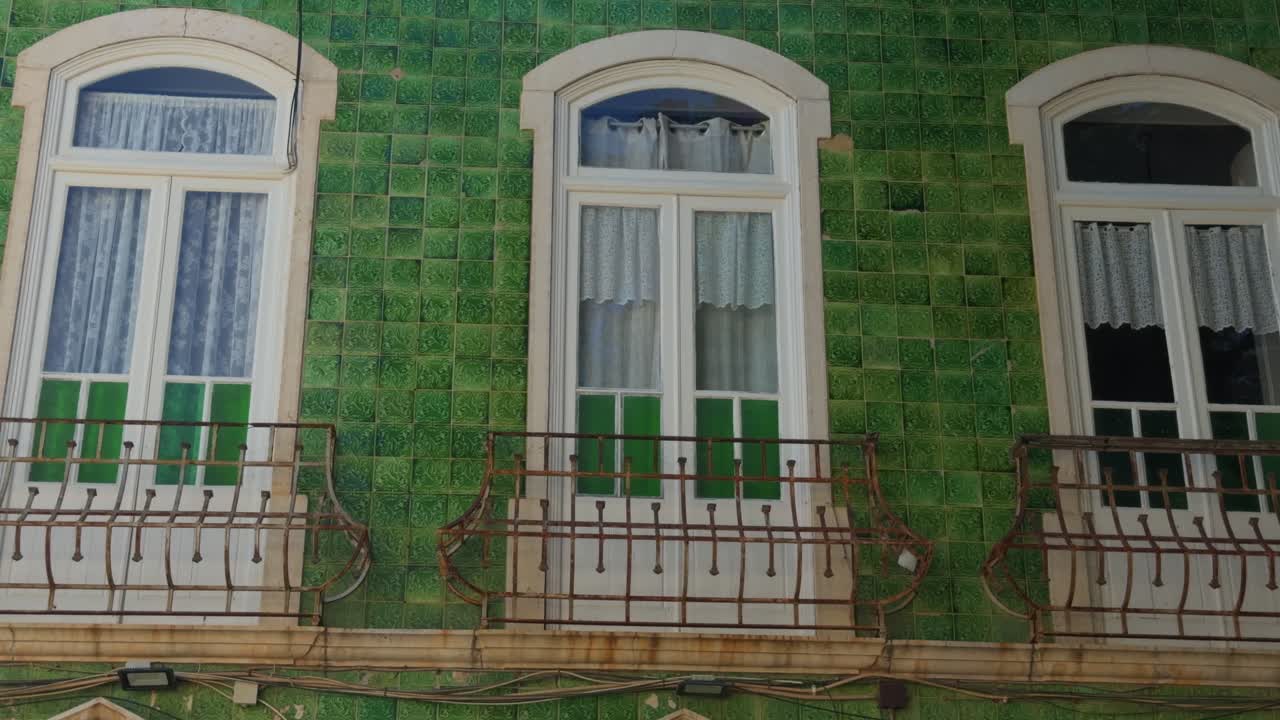 Algarve epic locations Historic Lagos town centre green tiled building.in summer streetscapes