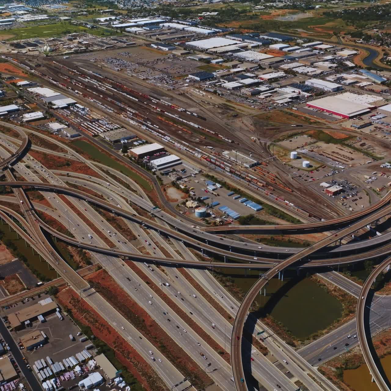 Complexity of highways in Salt Lake City, Utah, USA. Quick traffic on the roads of the metropolis outskirts. Aerial view