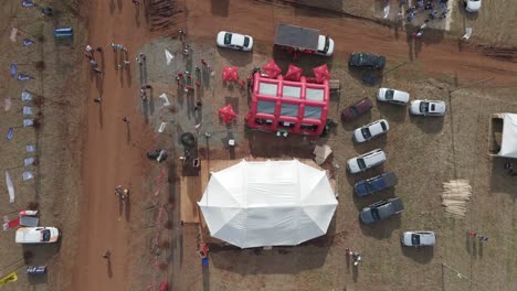 Top-down-view-of-vendor-tents-offering-farm-and-forestry-goods,-tools-and-products