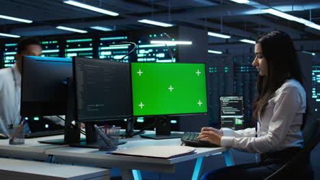 Technician-using-mockup-computer-in-data-center