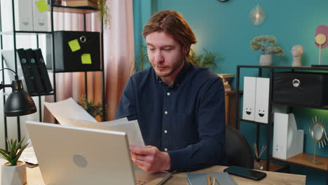 business office man receiving documents from boss and working with financial graph calculate taxes