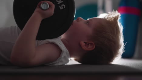 Strong-little-boy-continues-doing-difficult-exercise