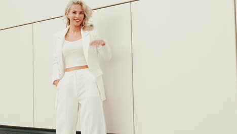 stylish woman in white suit