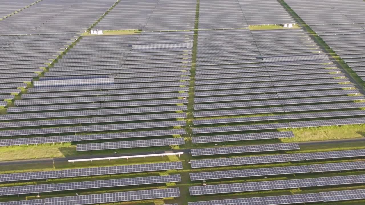 Detailed view of aligned solar panels capturing sunlight for energy production.