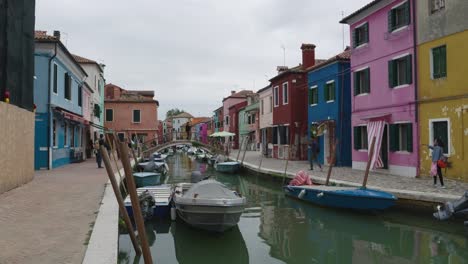 stunning burano island near venice with small canal and colorful houses