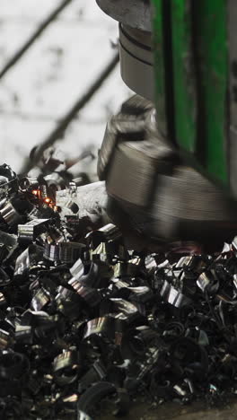 close-up of metal shavings and sparks during industrial machining process