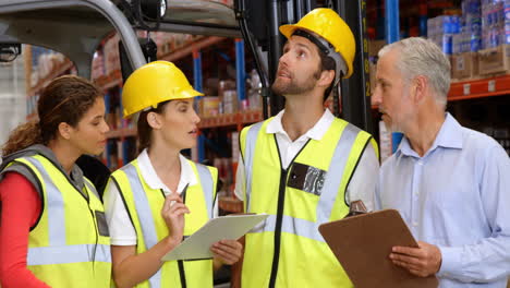 warehouse workers working together