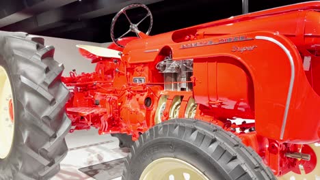 A red Porsche Diesel Super tractor
