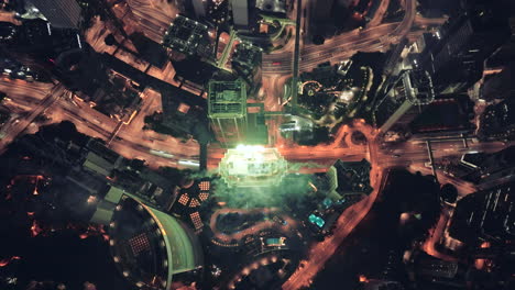 Aerial-top-down-shot-of-New-Year's-Eve-fireworks-on-top-of-One-Pacific-Place-at-night-in-Admiralty-district,Hong-Kong