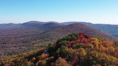 an aerial shot of tibbet knob and great north mountain in autumn