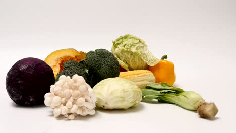 fresh vegetables on a white background. stop motion animation loop