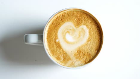 Overhead-View-Of-Fresh-Coffee-With-Heart-Shape-In-Froth