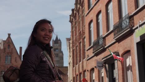 exploring historical city landmarks, young asian tourist sightseeing
