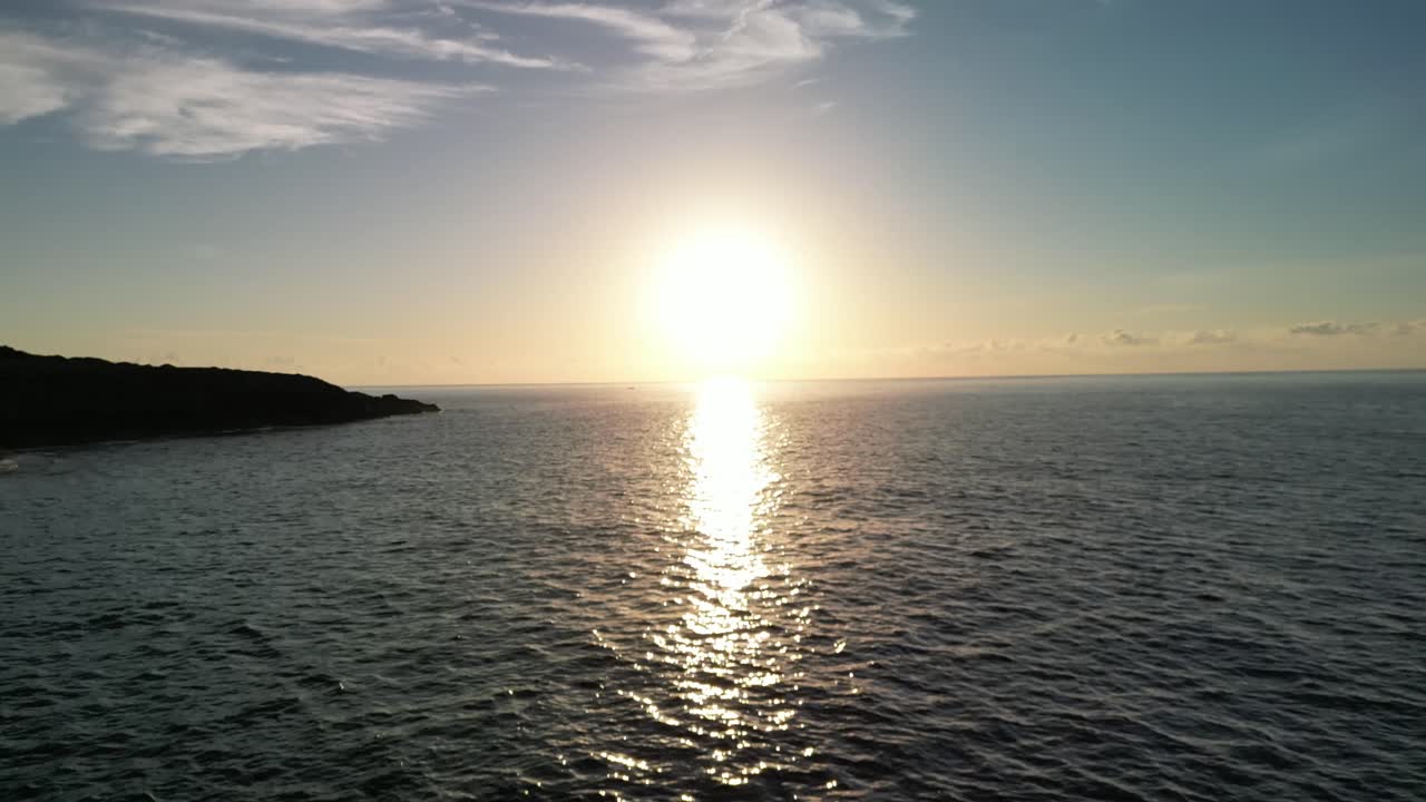 Glorious Sunrise Reflections On Calm Sea Waters Near Sa Coma In Mallorca, Spain. wide aerial
