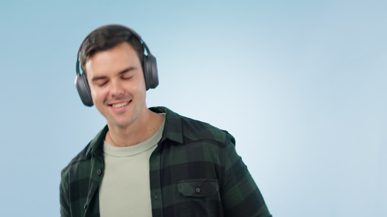 Happy, dance and man with music headphones