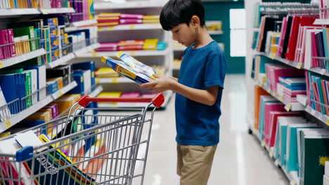 Young Boy Shopping for School Supplies