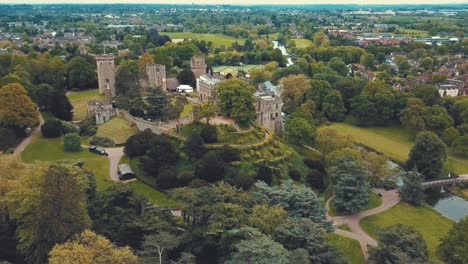 aerial fly over the midevil warwick castle in england, originally built by william the conqueror in 1608