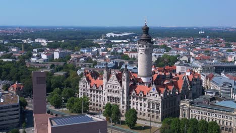 leipzig new city hall, a stunning example of german renaissance architecture, surrounded by the bustling city on a bright summer day