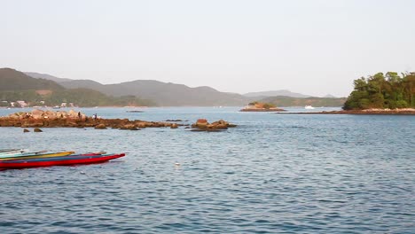 Empty-dragon-boats-parking-at-Sai-Kung,-dusk-view,-Hong-Kong