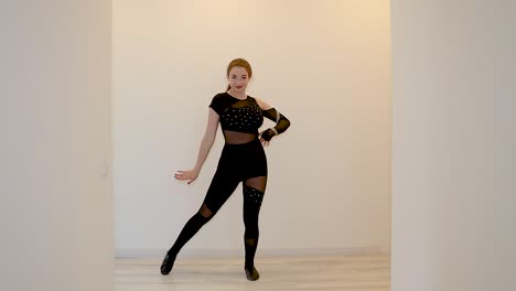 modern young female dance performer teaching an online dance class from home slow motion