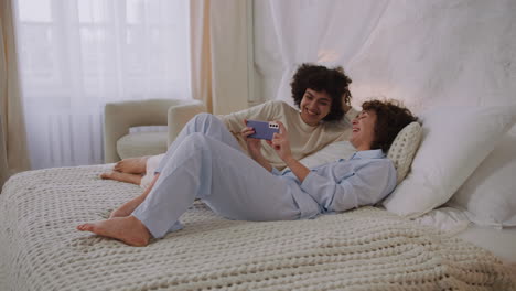 lovely couple laying on bed