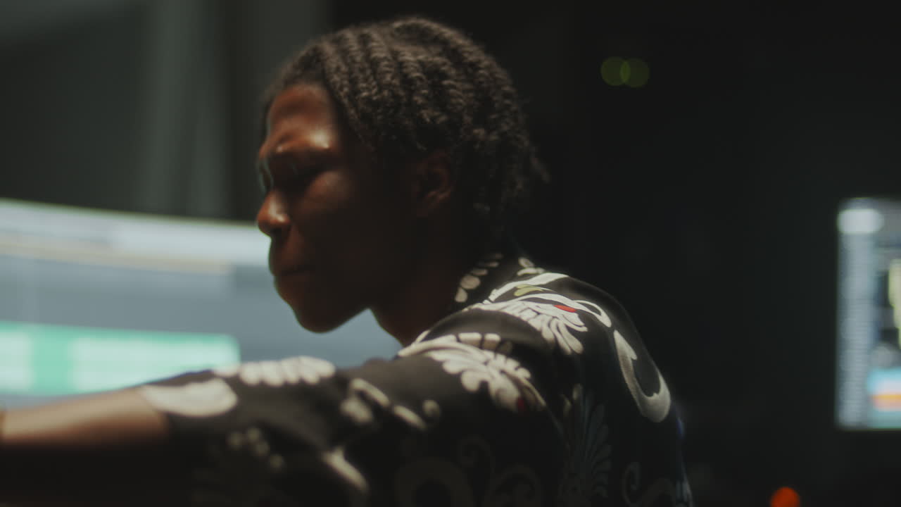 African American Musician Recording New Track in Audio Studio