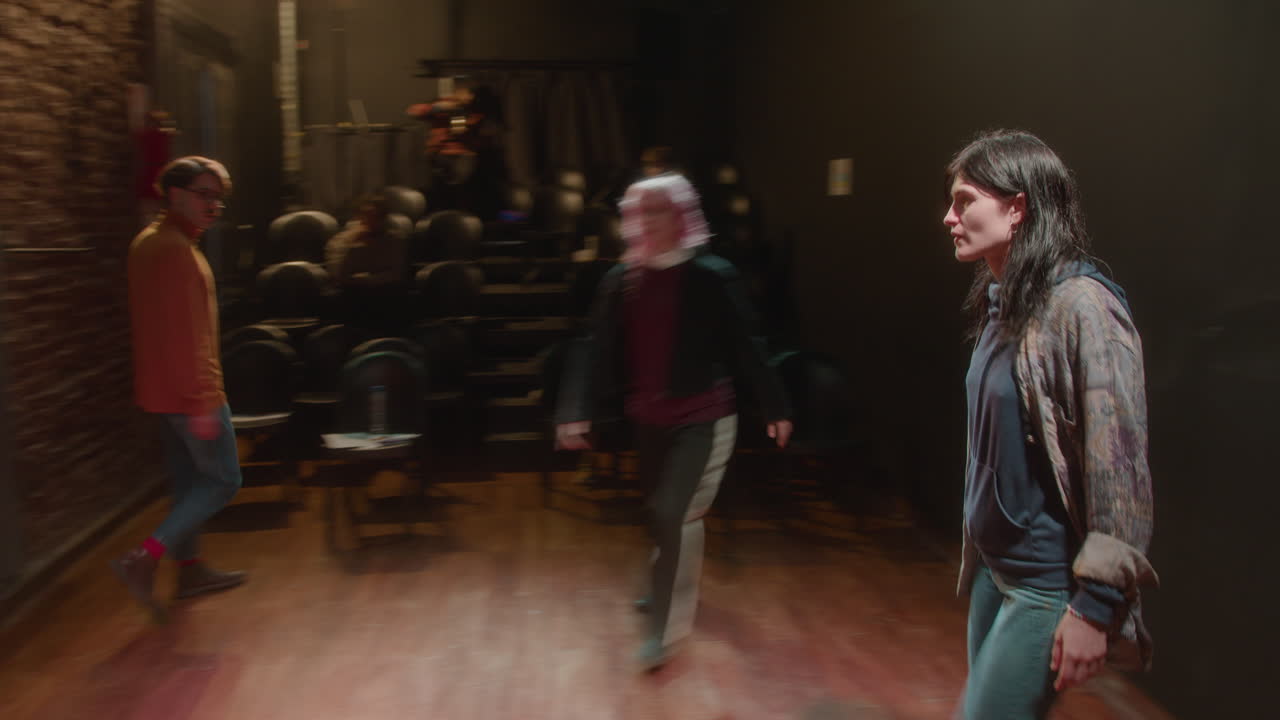 Young Actors Performing on Stage of Modern Theater