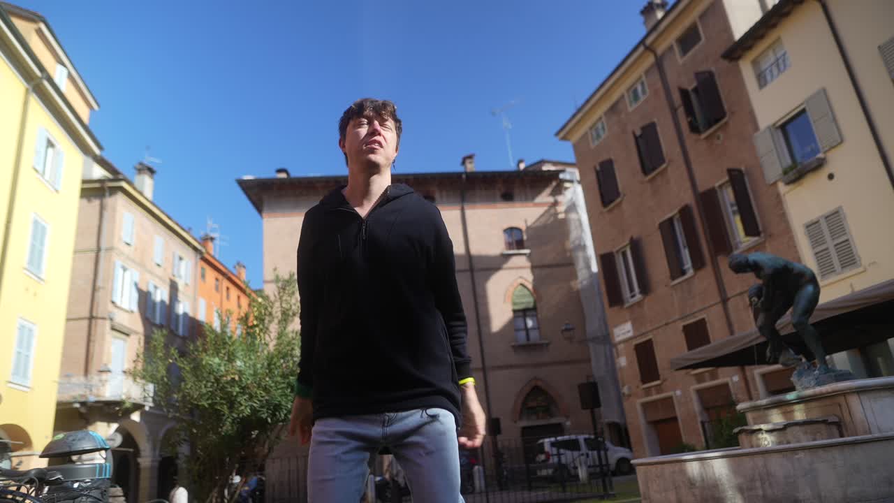 Young Man Posing in Italian Square