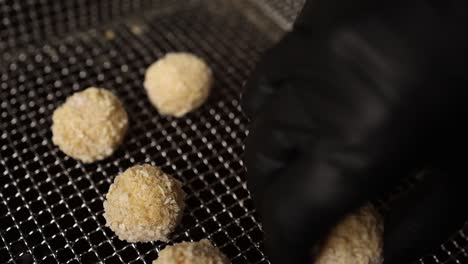 cooking breaded food balls