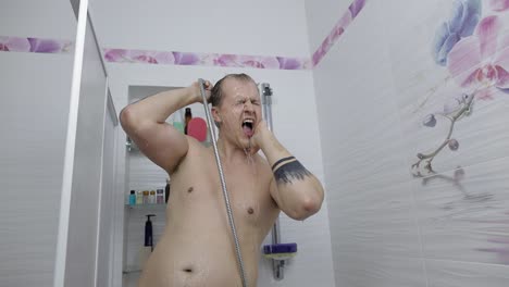 man showering in bathroom