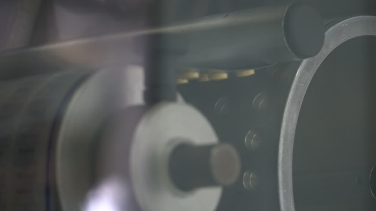 Drug tablets are rolled on cylinder machine for plastic packaging, static