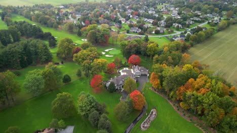 Aerial-drone-view-of-home-in-suburban-neighborhood