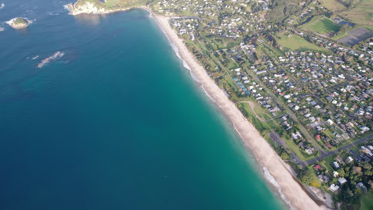 Aerial View of a Coastal Town and Beach