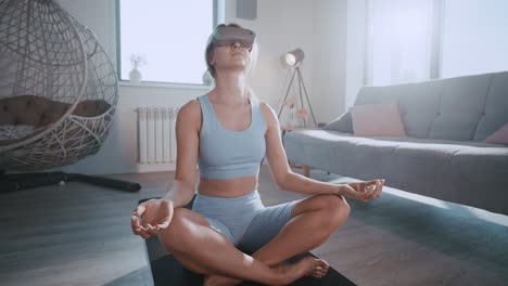 woman practicing vr yoga in a living room