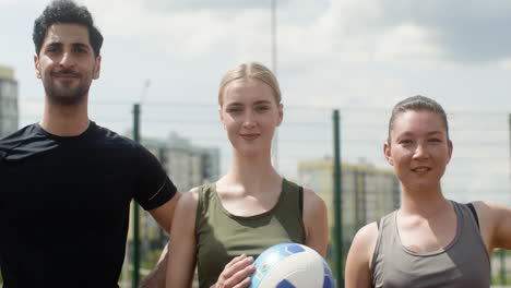 Close-up-view-of-multiethnic-friends-in-sportswear