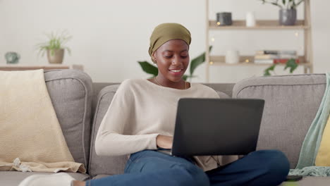 Laptop,-research-and-black-woman-on-sofa-working
