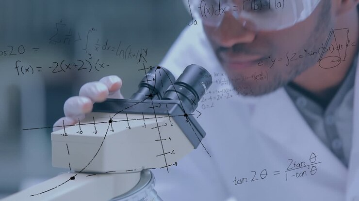 Cientistas olhando através do microscópio