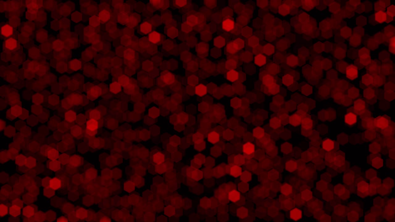 Abstract background animation loop features shimmering red hexagonal bokeh shapes. Ideal for technology, data, science, or romantic concept visuals