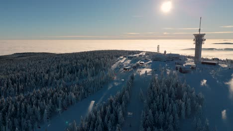 aerial view of czech ski resort on klinovec mountain with two slopes and a communications tower