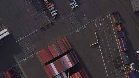 carefully arranged massive storage containers in the port of tacoma - aerial shot