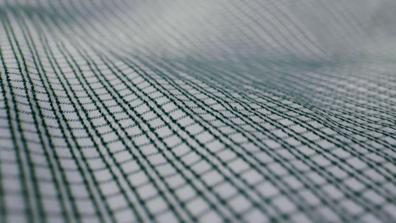 Closeup of an expertly tailored suit that beautifully showcases its sophisticated buttons and fine fabric texture