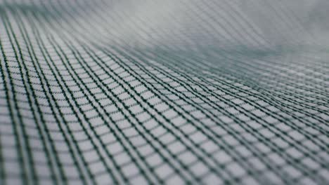 closeup of an expertly tailored suit that beautifully showcases its sophisticated buttons and fine fabric texture