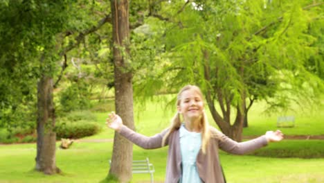 cute little girl spinning in circles