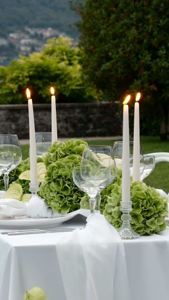 Elegant Table Setting with Candles and Hydrangeas