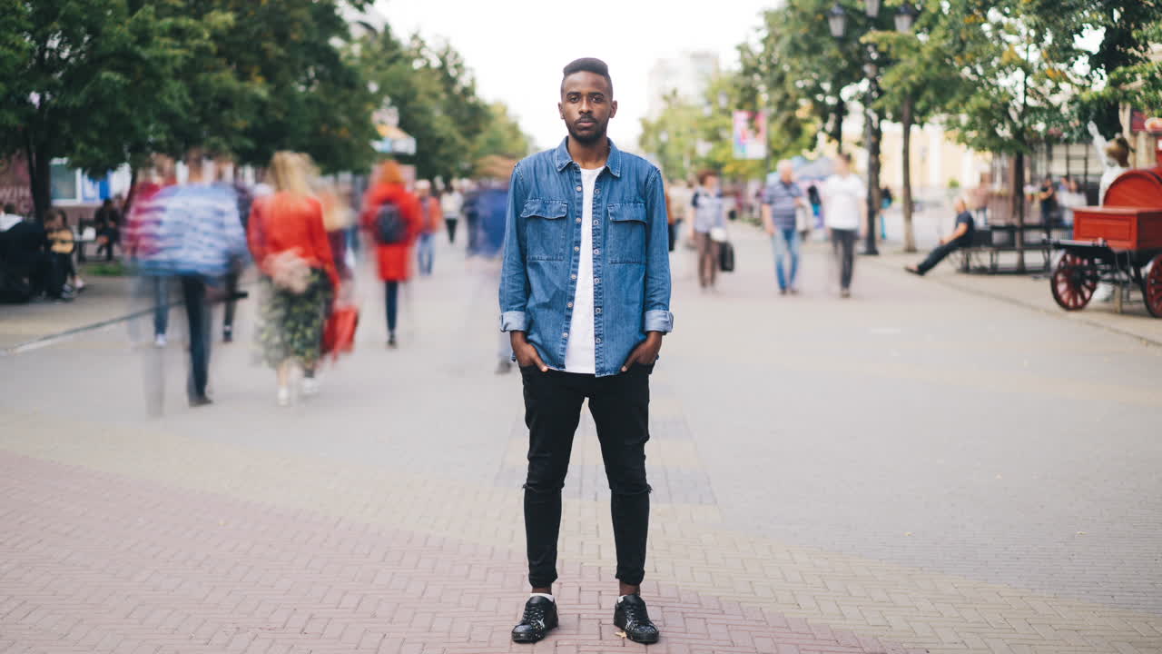 Man Standing on City Street